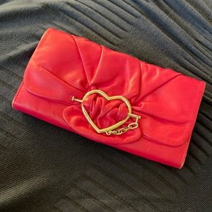 MOSCHINO clutch. Very pretty fuchsia magenta color. Buttery leather